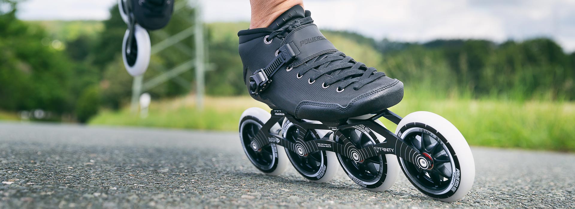 Close up image of a four-wheel Powerslide inline speed skate