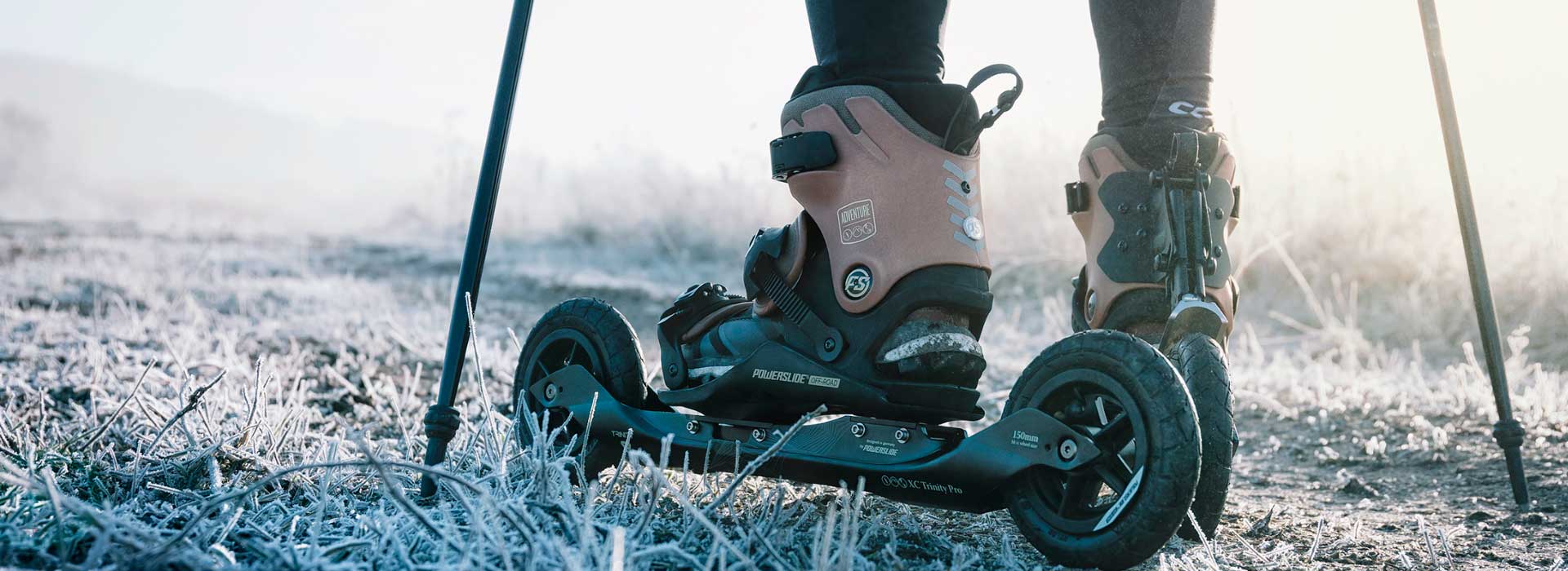 A close-up of a person wearing Powerslide adventure inline skates